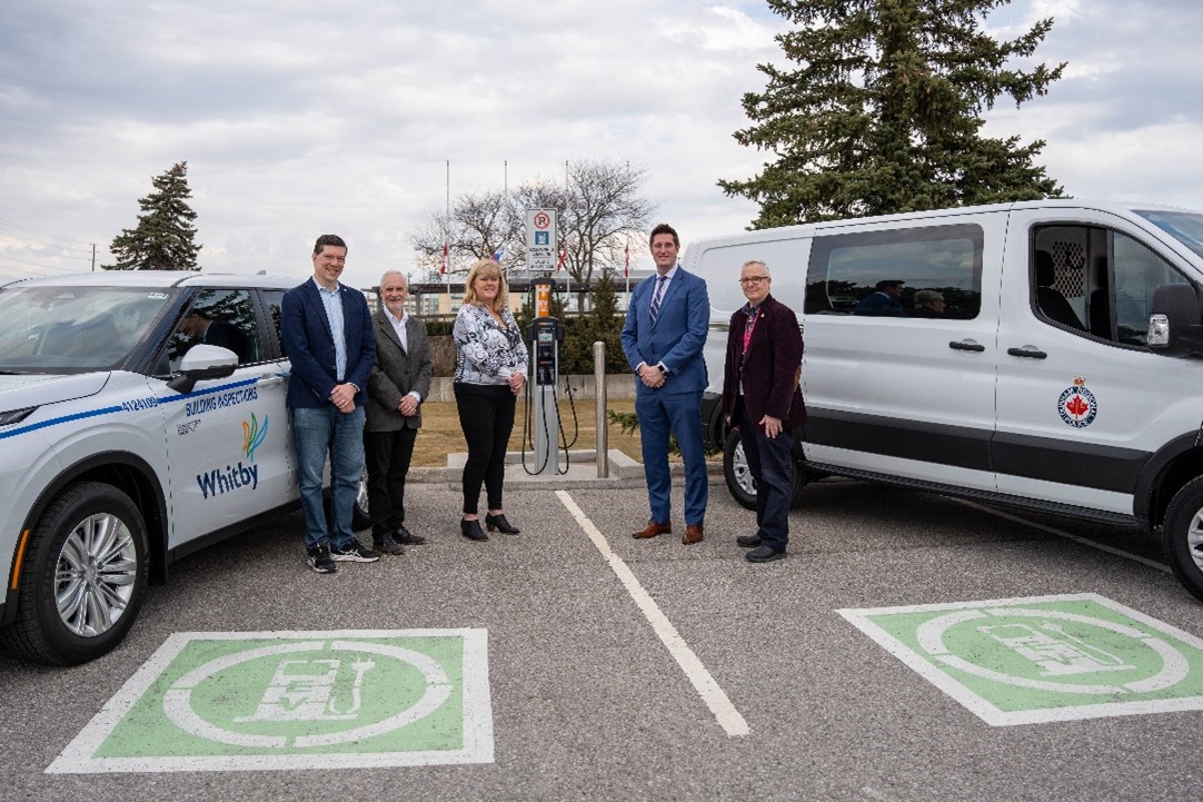 A photo at the NRCan ZEVIP funding announcement. Pictured from right to left - Councillor Leahy, Mayor Adrian Foster, May Elizabeth Roy, Member of Parliament, Ajax Ryan Turnbull.