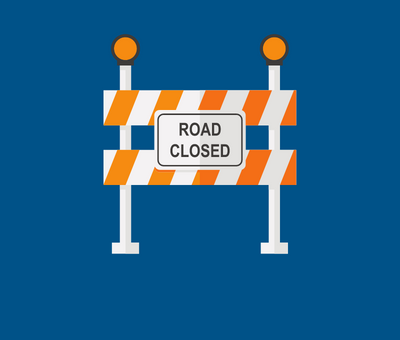 An icon of an orange and white striped road closed sign on a navy background.