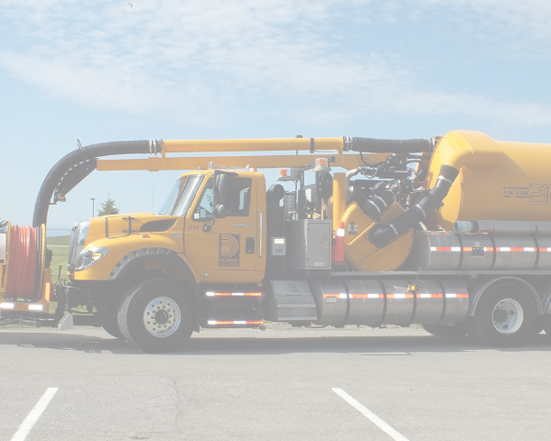 A photo of a yellow Durham Region Works Department vehicle with a light filter over it