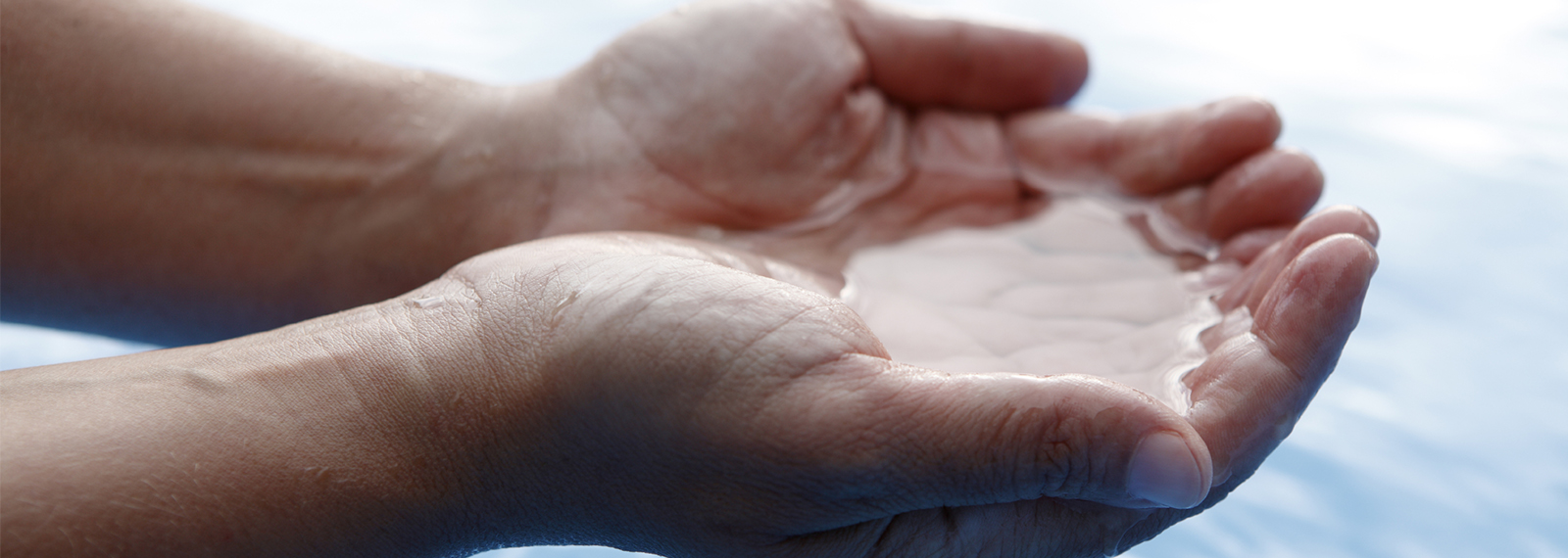 hands cupping water