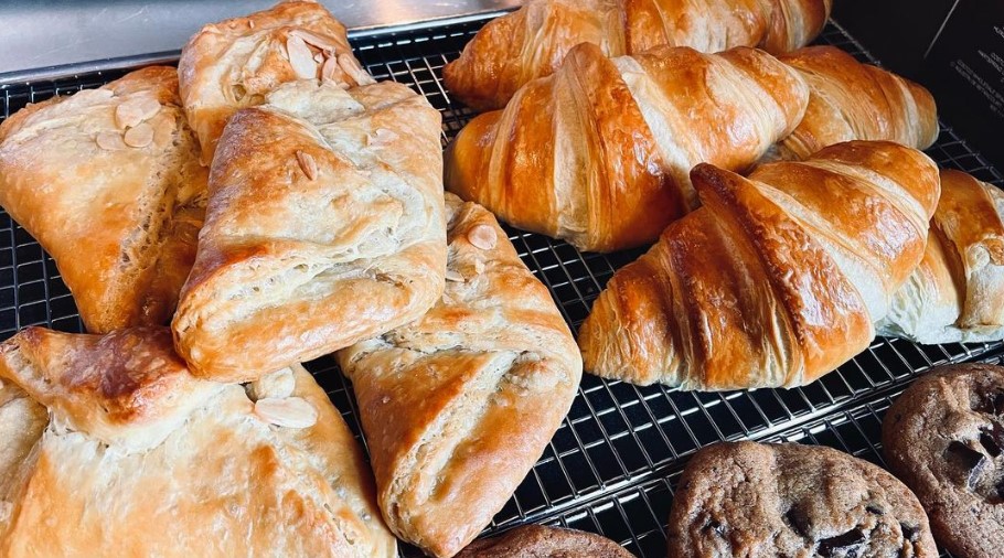 Image of cookies, croissants, and pastries topped with almonds