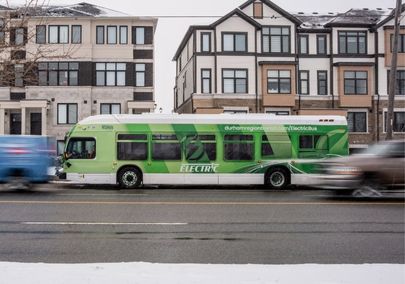 Durham Region Transit bus driving in the winter snow