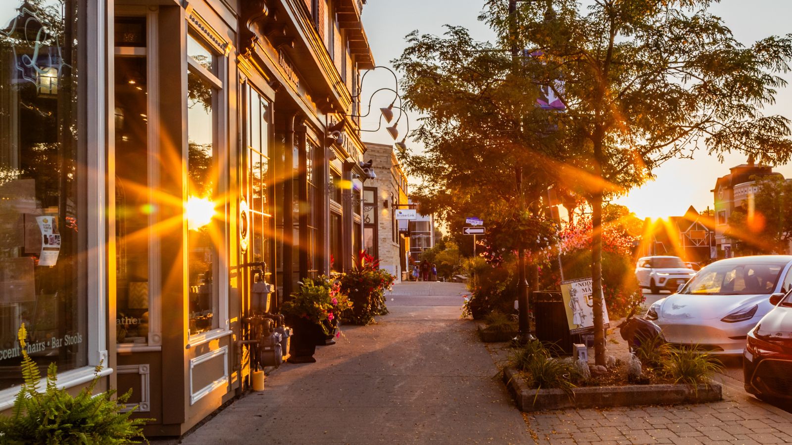 Sun beaming onto the window of a storefront in downtown Uxbridge, Ontario, Canada.