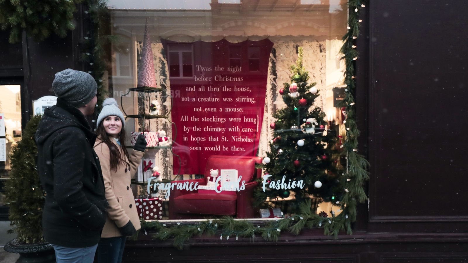 Couple exploring downtown Port Perry during the holidays