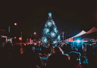 Photo by viewtacular of a crowd of people surrounded by holiday lights in Pickering Village in Ajax, Ontario