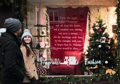 Two people shopping for the holidays in downtown Port Perry, Ontario, Canada