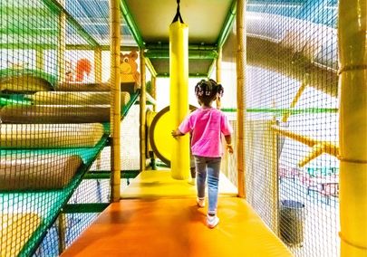 A young child playing at Neb's Fun World in Oshawa, Ontario, Canada