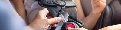 Child be buckled properly in a car seat