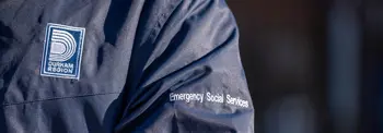 Dark blue shirt with Durham Region logo and Emergency Social Services written on sleeve