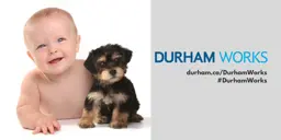 An image of a baby and a puppy next to text that states, “Durham Works, durham.ca/DurhamWorks #DurhamWorks"