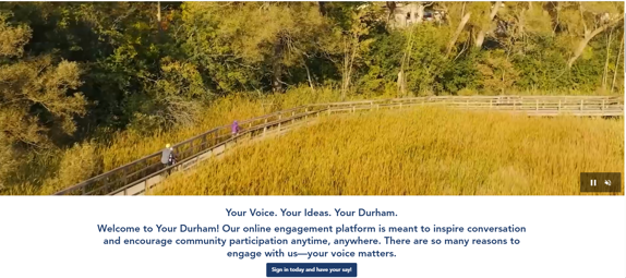 A picture of a golden wheatfield with writing a the bottom that sys "Your Voice, your ideas, your Durham."