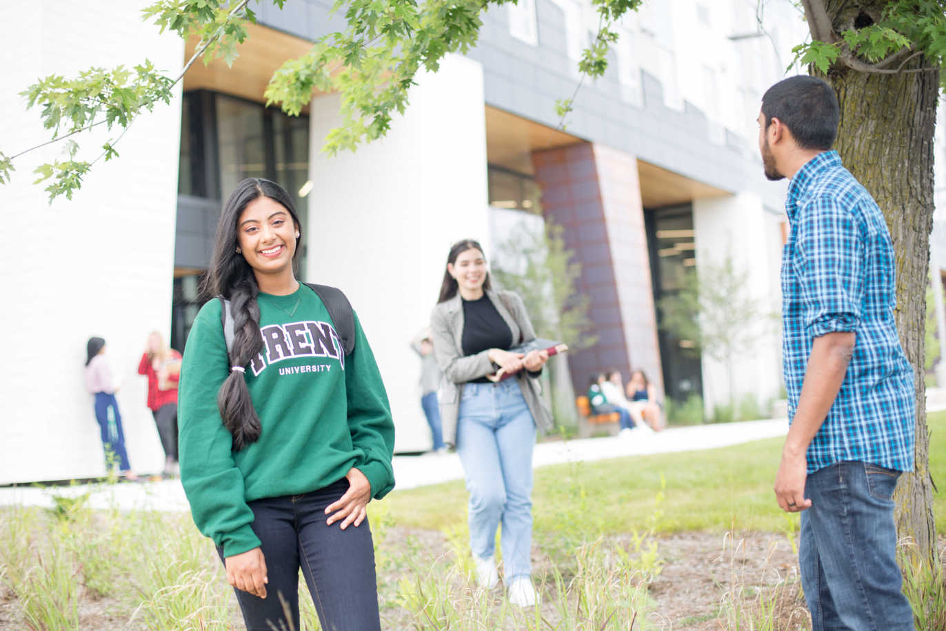 Students outside on the Trent University campus.