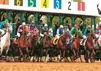 Multiple people on horseback