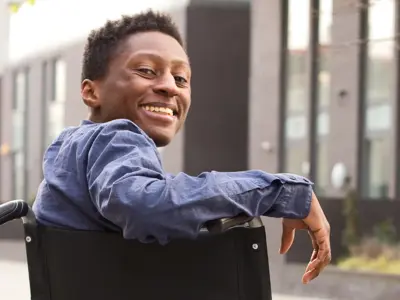 Person in wheelchair outside 