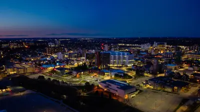 Drone shot of downtown Oshawa at night.