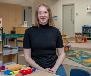Photo of Olivia in a child care centre.