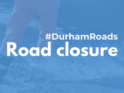 A photo of a construction worker working on a road with a light blue filter over it and white text reading #DurhamRoads Road closure